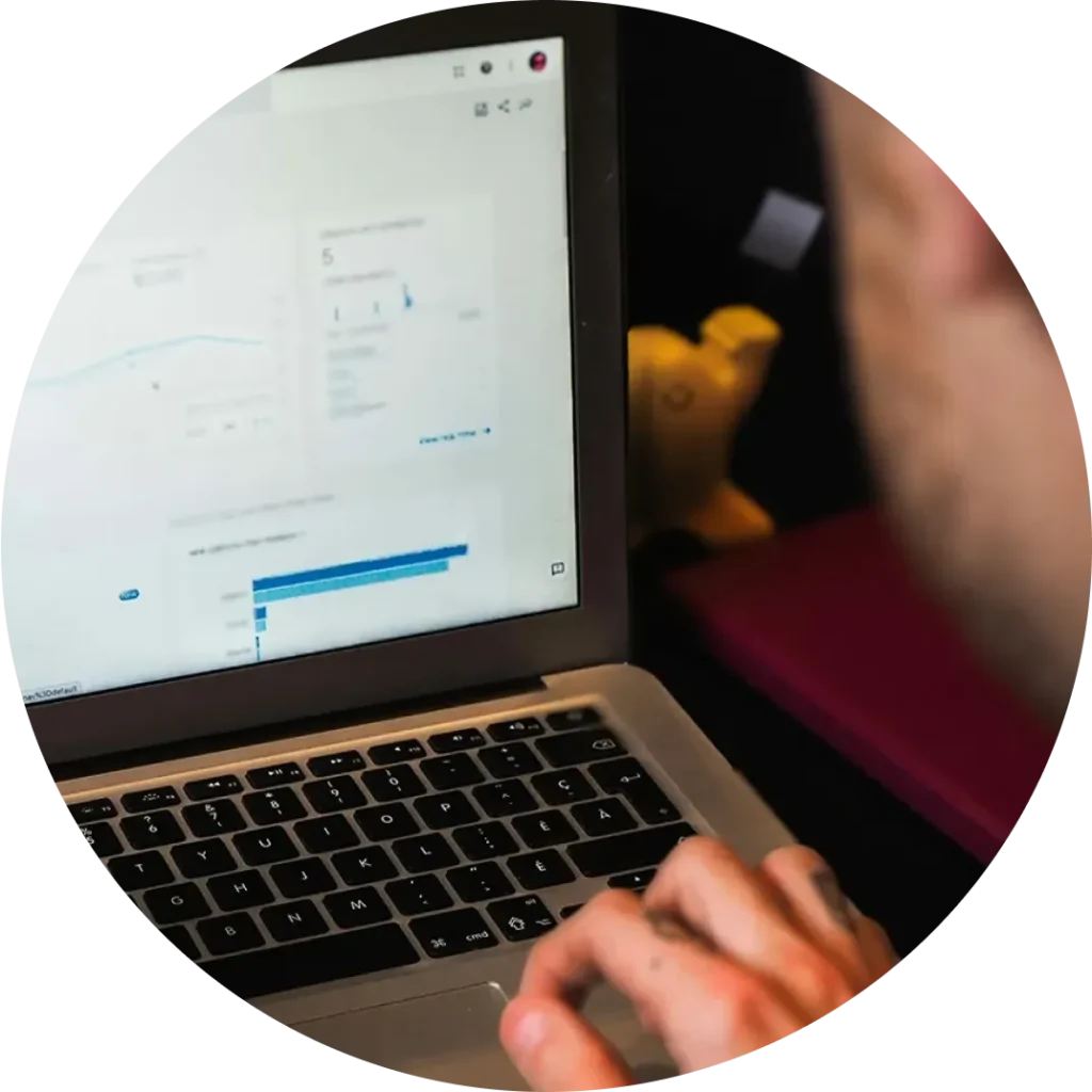 person working on computer looking at analytics data